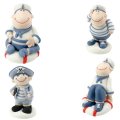 4 figurines marins